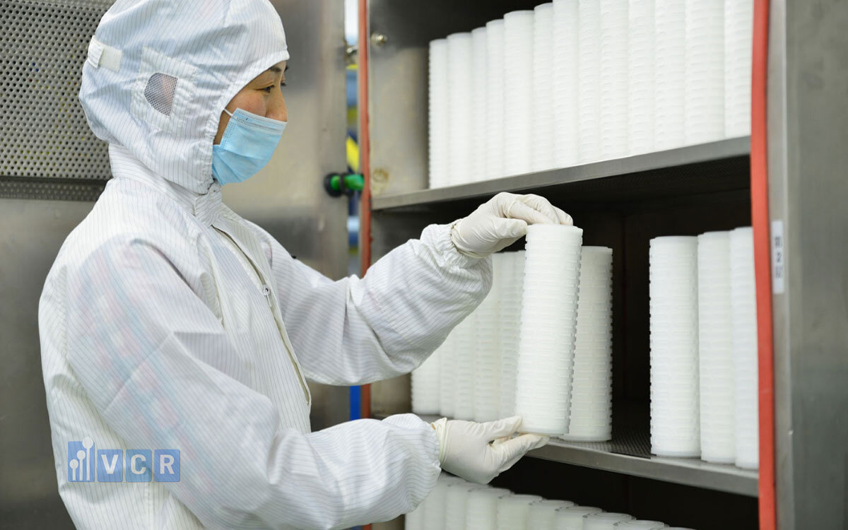 LÕI GIẤY XẾP TRONG DÂY CHUYỀN NƯỚC ĐÓNG CHAI